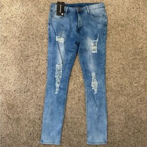 Means blue distressed skinny jeans.